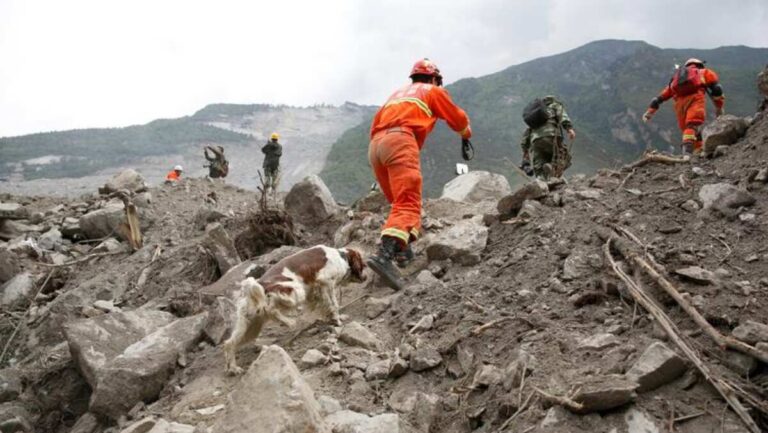 landslide in Jinping Village, Sichuan province, China, showing the debris and rescue operations in progress