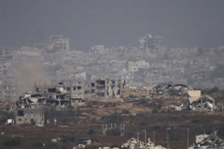 Aftermath of the Israel Gaza Attack—destroyed buildings and civilians searching for survivors amidst the rubble.
